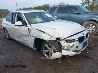 2015 BMW 3 Series 328i xDrive with VIN WBA3B5G59FNS19005, listed as a IAAI auction lot 41570070 with 104,666 mi miles. Bid and sale history available at carsss.com. Image 1.