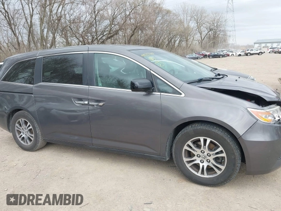 2012 Honda Odyssey EX-L with VIN 5FNRL5H60CB081866, listed as a IAAI auction lot 41835701 with 151,236 mi miles and . Bid and sale history available at DreamBid. Image 13.