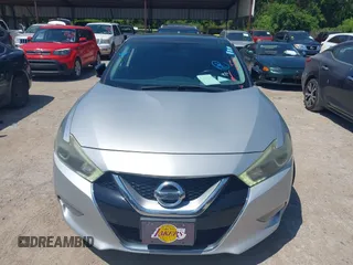 2016 Nissan Maxima SL with VIN 1N4AA6AP1GC430988, listed as a IAAI auction lot 42047844 with 122,685 mi miles and . Bid and sale history available at DreamBid. Image 6.