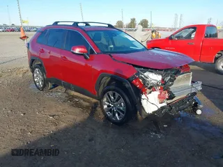 2021 Toyota RAV4 XLE Premium with VIN 2T3C1RFV1MW145048, listed as a IAAI auction lot 41018272 with 61,959 mi miles and . Bid and sale history available at DreamBid. Image 1.