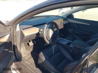 2023 Tesla Model 3 with VIN 5YJ3E1EA2PF642253, listed as a IAAI auction lot 41777160 with 29,817 mi miles. Bid and sale history available at carsss.com. Image 5.