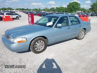 2005 Mercury Grand Marquis LS Premium z VIN 2MEFM75W15X621971, wystawiony jako IAAI lot #42130811 z przebiegiem 129 700 mil mil oraz . Historia ofert i sprzedaży dostępna na DreamBid. Obrazek 2.