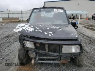 1992 Geo Tracker z VIN 2CNBJ18U8N6938728, wystawiony jako Copart lot #79459914 z przebiegiem 17 751 mil mil oraz Szkody całkowita. Historia ofert i sprzedaży dostępna na DreamBid. Obrazek 5.