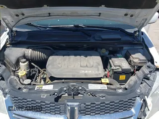 2014 Dodge Grand Caravan SXT with VIN 2C4RDGCG1ER429495, listed as a IAAI auction lot 42058513 with 136,936 mi miles and . Bid and sale history available at DreamBid. Image 10.