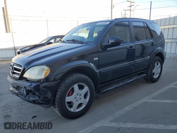 2001 Mercedes-Benz M-Class AMG with VIN 4JGAB74E71A223107, listed as a Copart auction lot 85156594 with 184,928 mi miles and Salvage Title. Bid and sale history available at carsss.com. Image 1.