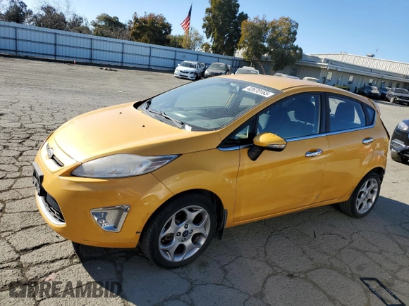 2011 Ford Fiesta SES with VIN 3FADP4FJ6BM124655, listed as a Copart auction lot 42670165 with 112,008 mi miles and Salvage Title. Bid and sale history available at carsss.com. Image 1.
