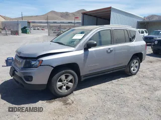 2016 Jeep Compass Sport with VIN 1C4NJCBB2GD577084, listed as a IAAI auction lot 42572348 with 164,234 mi miles and . Bid and sale history available at DreamBid. Image 2.