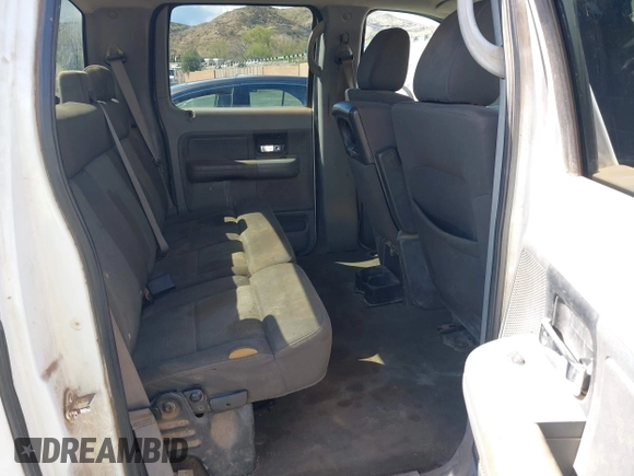 2005 Ford F-150 XLT with VIN 1FTRW12W65FA14163, listed as a IAAI auction lot 41754075 with 94,853 mi miles. Bid and sale history available at carsss.com. Image 8.