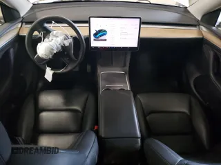 2023 Tesla Model Y Long Range z VIN 7SAYGDEE5PA067389, wystawiony jako Copart lot #54109625 z przebiegiem 24 849 mil mil oraz Szkody całkowita. Historia ofert i sprzedaży dostępna na DreamBid. Obrazek 8.