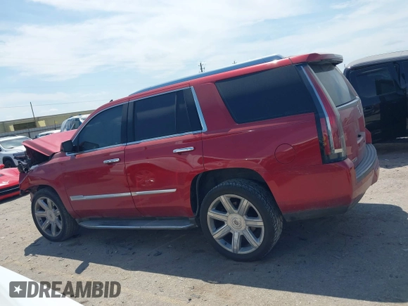 2015 Cadillac Escalade Luxury z VIN 1GYS3BKJ3FR275149, wystawiony jako IAAI lot #42052367 z przebiegiem 111 133 mil mil oraz . Historia ofert i sprzedaży dostępna na DreamBid. Obrazek 14.
