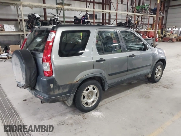 2006 Honda CR-V LX with VIN JHLRD785X6C053853, listed as a IAAI auction lot 42018895 with 246,316 mi miles and . Bid and sale history available at carsss.com. Image 4.