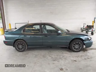 1997 Honda Accord EX with VIN 1HGCD5669VA090505, listed as a IAAI auction lot 42138093 with 207,191 mi miles and . Bid and sale history available at carsss.com. Image 13.