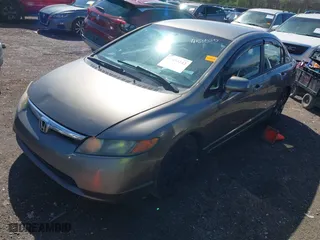 2006 Honda Civic Sdn LX with VIN 1HGFA16516L060197, listed as a IAAI auction lot 41855242 with 204,499 mi miles. Bid and sale history available at carsss.com. Image 2.