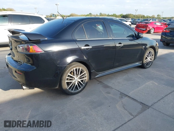2017 Mitsubishi Lancer ES with VIN JA32V2FWXHU000916, listed as a IAAI auction lot 41727166 with 85,182 mi miles. Bid and sale history available at carsss.com. Image 4.