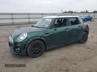 2015 MINI Hardtop 4 Door z VIN WMWXS5C51FT830049, wystawiony jako Copart lot #57318635 z przebiegiem 68 208 mil mil oraz Szkody całkowita. Historia ofert i sprzedaży dostępna na DreamBid. Obrazek 1.