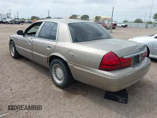 2004 Mercury Grand Marquis GS with VIN 2MEFM74W94X671873, listed as a IAAI auction lot 42130841 with 92,757 mi miles and . Bid and sale history available at DreamBid. Image 3.