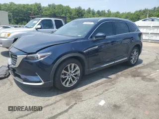 2016 Mazda CX-9 Grand Touring z VIN JM3TCBDY3G0125740, wystawiony jako Copart lot #59699385 z przebiegiem 162 650 mil mil oraz Szkoda całkowita • Salvage title. Historia ofert i sprzedaży dostępna na DreamBid. Obrazek 1.