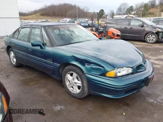1996 Pontiac Bonneville z VIN 1G2HZ5210TH210829, wystawiony jako IAAI lot #41203888 z przebiegiem 154 990 mil mil oraz . Historia ofert i sprzedaży dostępna na DreamBid. Obrazek 1.
