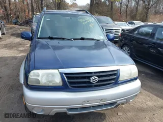 2003 Suzuki Grand Vitara with VIN JS3TD62V534105807, listed as a IAAI auction lot 41662214 with 111,087 mi miles. Bid and sale history available at carsss.com. Image 6.