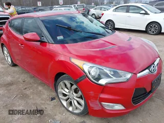 2012 Hyundai Veloster w/Gray Int z VIN KMHTC6AD9CU052342, wystawiony jako IAAI lot #42072428 z przebiegiem 103 338 mil mil oraz . Historia ofert i sprzedaży dostępna na DreamBid. Obrazek 1.