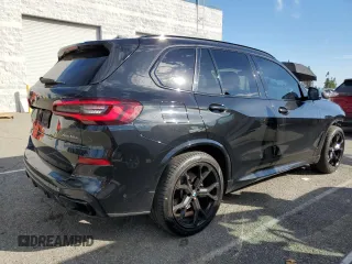 2021 BMW X5 xDrive45e with VIN 5UXTA6C03M9H56515, listed as a Copart auction lot 45798715 with 59,156 mi miles and Salvage Title. Bid and sale history available at carsss.com. Image 3.