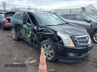 2011 Cadillac SRX Performance Collection with VIN 3GYFNEEY6BS541213, listed as a IAAI auction lot 42020305 with 225,390 mi miles. Bid and sale history available at carsss.com. Image 1.