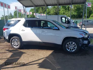 2018 Chevrolet Traverse LT Cloth z VIN 1GNEVGKWXJJ270664, wystawiony jako IAAI lot #42176492 z przebiegiem 73 534 mil mil oraz . Historia ofert i sprzedaży dostępna na DreamBid. Obrazek 14.