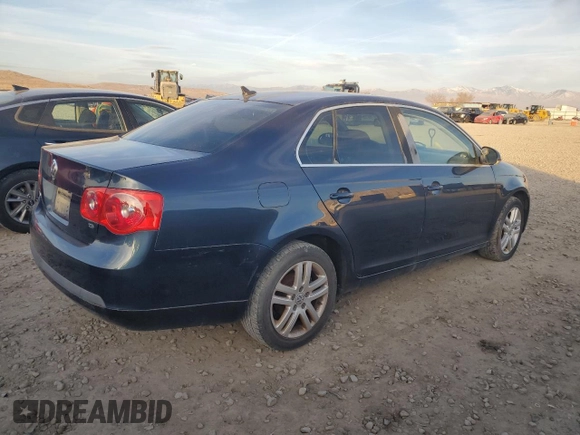 2007 Volkswagen Jetta z VIN 3VWDG71K27M010409, wystawiony jako Copart lot #84155424 z przebiegiem 140 665 mil mil oraz Czysty tytuł • Clean title. Historia ofert i sprzedaży dostępna na DreamBid. Obrazek 3.