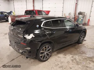 2020 BMW X2 xDrive28i with VIN WBXYJ1C07L5R28321, listed as a IAAI auction lot 41409807 with 41,296 mi miles. Bid and sale history available at carsss.com. Image 4.