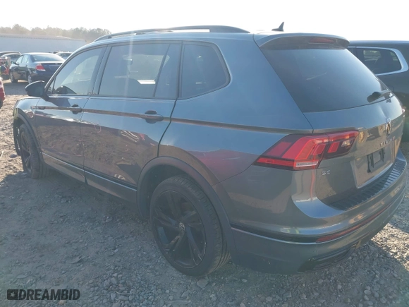 2023 Volkswagen Tiguan SE R-Line Black with VIN 3VV8B7AX3PM014632, listed as a IAAI auction lot 41002858 with 40,955 mi miles. Bid and sale history available at carsss.com. Image 3.