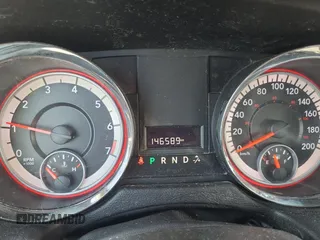 2014 Dodge Grand Caravan American Value with VIN 2C4RDGBGXER413961, listed as a Copart auction lot 54748405 with 146,589 mi miles and Clean Title. Bid and sale history available at DreamBid. Image 8.