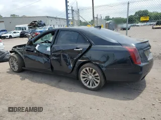 2016 Cadillac CTS Luxury Collection AWD with VIN 1G6AX5SX0G0102225, listed as a Copart auction lot 60400525 with 115,935 mi miles and Salvage title. Bid and sale history available at DreamBid. Image 2.