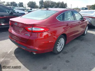 2014 Ford Fusion Energi SE Luxury with VIN 3FA6P0PUXER234528, listed as a IAAI auction lot 41644935 with 151,059 mi miles. Bid and sale history available at carsss.com. Image 4.