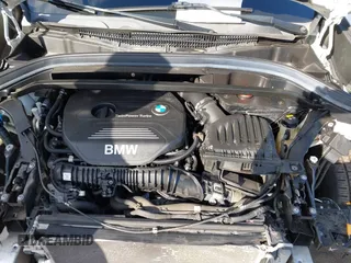 2018 BMW X1 xDrive28i with VIN WBXHT3C34J5L29714, listed as a IAAI auction lot 41825126 with 89,970 mi miles. Bid and sale history available at carsss.com. Image 10.
