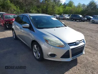 2014 Ford Focus SE with VIN 1FADP3K21EL367563, listed as a IAAI auction lot 41884406 with 99,394 mi miles. Bid and sale history available at carsss.com. Image 1.