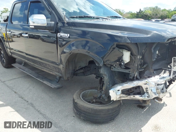 2015 Ford F-150 XLT with VIN 1FTEW1EF4FFC52928, listed as a IAAI auction lot 41994726 with 211,628 mi miles. Bid and sale history available at carsss.com. Image 1.
