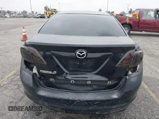 2012 Mazda 6 i Sport with VIN 1YVHZ8BH6C5M03802, listed as a IAAI auction lot 42041022 with 202,047 mi miles and . Bid and sale history available at carsss.com. Image 6.