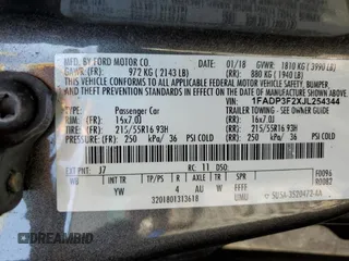 2018 Ford Focus SE with VIN 1FADP3F2XJL254344, listed as a Copart auction lot 54663115 with 84,850 mi miles and Salvage title. Bid and sale history available at DreamBid. Image 13.