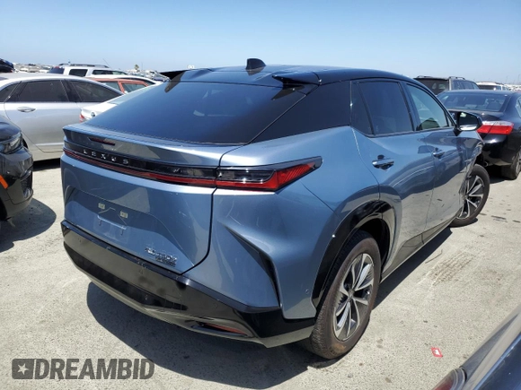 2023 Lexus RZ 450e Premium z VIN JTJAAAAB3PA000731, wystawiony jako Copart lot #57350214 z przebiegiem 7 642 mil mil oraz Szkoda całkowita • Salvage title. Historia ofert i sprzedaży dostępna na DreamBid. Obrazek 3.