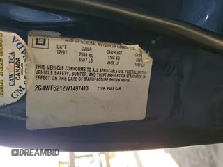 1998 Buick Regal GS with VIN 2G4WF5212W1497413, listed as a Copart auction lot 80577514 with 211,171 mi miles and Salvage Title. Bid and sale history available at carsss.com. Image 12.