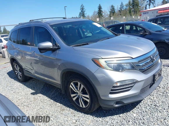 2016 Honda Pilot EX with VIN 5FNYF6H35GB001112, listed as a IAAI auction lot 42040410 with 206,424 mi miles. Bid and sale history available at carsss.com. Image 1.
