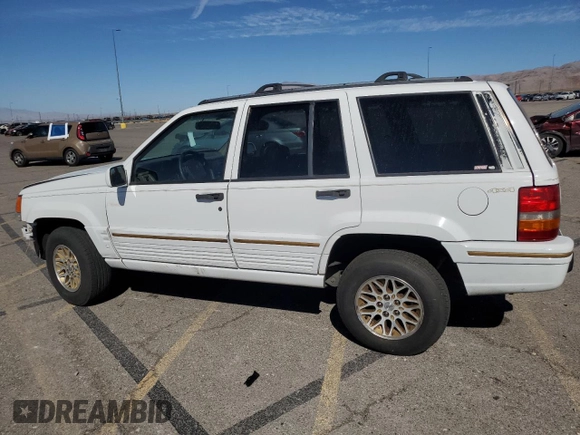 1995 Jeep Grand Cherokee Limited with VIN 1J4GZ78Y3SC701103, listed as a Copart auction lot 72038184 with 143,829 mi miles and Salvage Title. Bid and sale history available at carsss.com. Image 2.