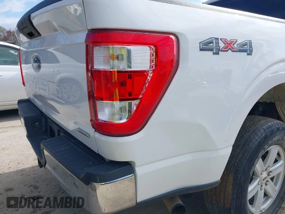 2021 Ford F-150 XL with VIN 1FTFW1E82MKD23506, listed as a IAAI auction lot 41876760 with 71,387 mi miles. Bid and sale history available at carsss.com. Image 14.