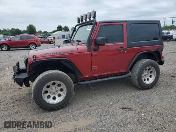 2012 Jeep Wrangler Sport z VIN 1C4AJWAG7CL105511, wystawiony jako Copart lot #62822985 z przebiegiem 137 520 mil mil oraz Czysty tytuł • Clean title. Historia ofert i sprzedaży dostępna na DreamBid. Obrazek 1.