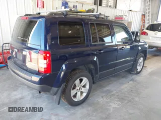 2014 Jeep Patriot Latitude with VIN 1C4NJRFB3ED863519, listed as a IAAI auction lot 42670843 with 220,920 mi miles and . Bid and sale history available at DreamBid. Image 4.