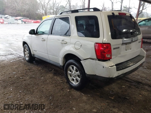 2008 Mazda Tribute ES with VIN 4F2CZ06148KM13459, listed as a IAAI auction lot 41742402 with 196,030 mi miles and . Bid and sale history available at DreamBid. Image 3.