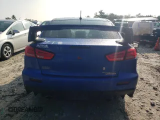 2015 Mitsubishi Lancer Evolution Final Edition z VIN JA32W7FV7FU608214, wystawiony jako Copart lot #68316174 z przebiegiem 56 714 mil mil oraz Szkody całkowita. Historia ofert i sprzedaży dostępna na DreamBid. Obrazek 6.