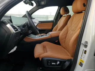 2024 BMW X5 xDrive50e with VIN 5UX43EU07R9S99719, listed as a Copart auction lot 86121144 with 0 mi miles and Salvage Title. Bid and sale history available at carsss.com. Image 7.