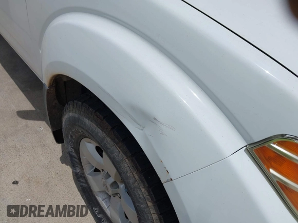 2012 Nissan Frontier SV z VIN 1N6AD0CU2CC438476, wystawiony jako IAAI lot #42525526 z przebiegiem 107 269 mil mil oraz . Historia ofert i sprzedaży dostępna na DreamBid. Obrazek 6.