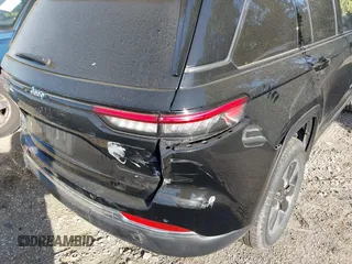 2023 Jeep Grand Cherokee with VIN 1C4RJYB68PC648859, listed as a IAAI auction lot 42267180 with 29,809 mi miles and . Bid and sale history available at DreamBid. Image 17.